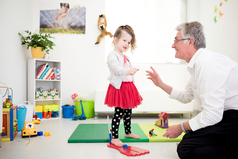 Our podiatrist Wes working with a child patient